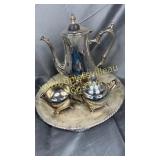 Silver plate tea service on tray-lid cracked