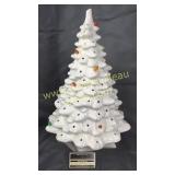 Vintage white ceramic Christmas tree in lighted