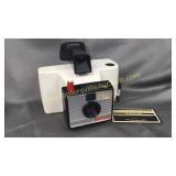 Vintage Polaroid swinger camera