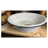 Black and white enamel ware dish pan