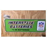 Embossed interstate batteries NFL sponsor sign