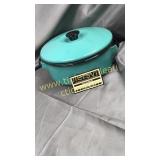 Teal enamel ware pot with lid