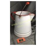 Large red and white enamel ware kettle