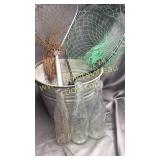 Beer, soda bottles and nets in galvanized bucket