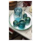 Insulators and jar in pasta bowl