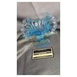 Light blue candy stand with pulled sides and