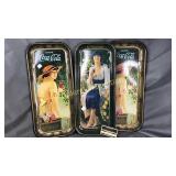 3 tall Coca-Cola trays