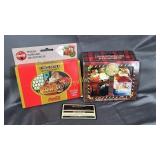 Coca-Cola collector cards in tins
