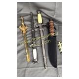 Group of reproduction daggers and knives