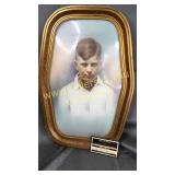 Slightly creepy antique portrait in frame