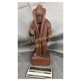 Wood carved statue man