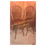 Pair of oak swivel bar stools