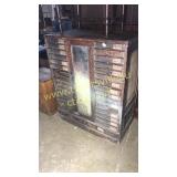 Antique optometrist or dental cabinet with glass