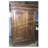 Large antique carved wardrobe very ornate