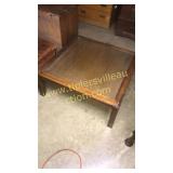 Glass top cocktail table