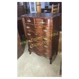 Nice mahogany serpentine front high boy chest of