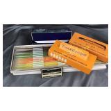 Vintage tapers and teardrop candles and cans