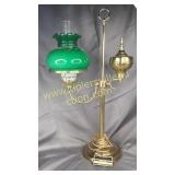 Brass arm lamp with green globe