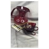 Ruby red pitcher with applied handle and 2 cups