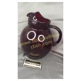 Ruby red pitcher with ice lip