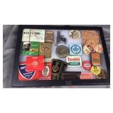 Display with matchbooks, vintage tins, tickets,