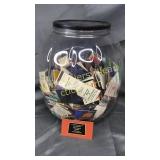 Vintage matchbox collection in plastic jar