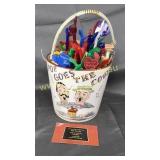 Vintage ice bucket with drink stirrers