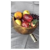 Wooden bowl with fake fruit