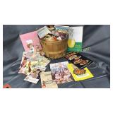 Basket of vintage recipe books/ advertising