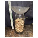 Vase full of wine corks