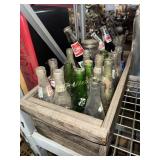 Crate of old soda bottles
