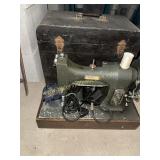 Antique white sewing machine