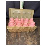 Adorable 1960s pink hair rollers set in celluloid