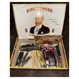 Cigar box of pocket knives