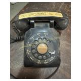 Black rotary telephone Coleman funeral home