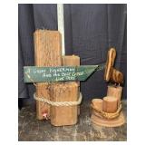 Wooden pelican and fishing statues