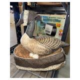 Goose pillow on basket nest