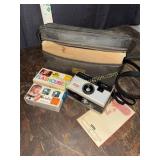Kodak instamatic camera with flash cubes and case
