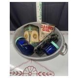 Colander with tins and jars
