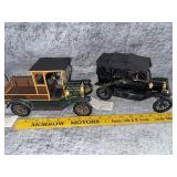 Two Franklin Mint scale models black one has