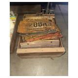 Crate of car license plates