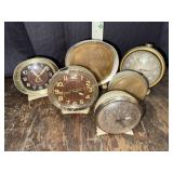Group of vintage alarm clocks most have some