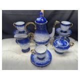 Blue and white raised cherub tea set