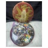 Vintage tin full of buttons