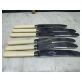 Vintage set of Sheffield dinner knives with faux