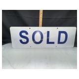 Metal blue sold sign
