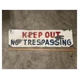 Metal no trespassing sign