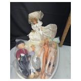 Basket of vintage dolls
