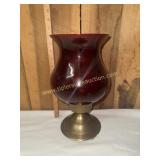Brass hurricane lantern with ruby globe