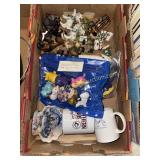 Box with toys, ornaments, figurines and mugs